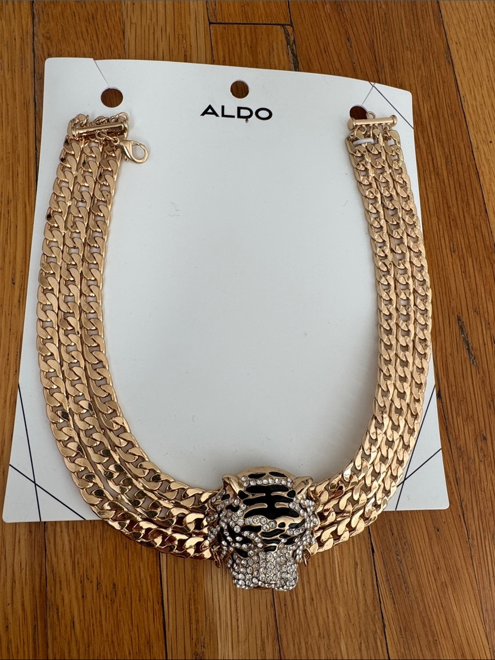 Aldo gold tone chain tiger necklace